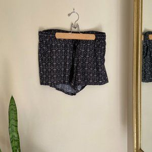 Black shorts with white design